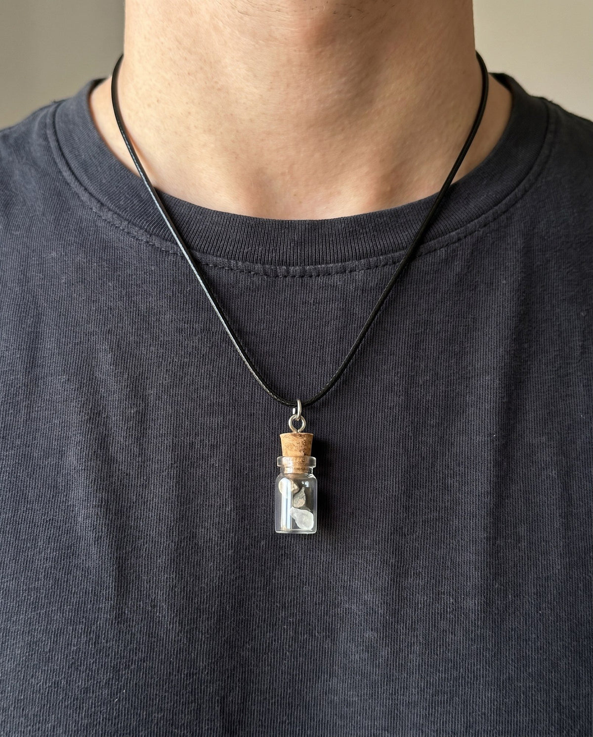 The Moon Mars Earth vial pendant worn