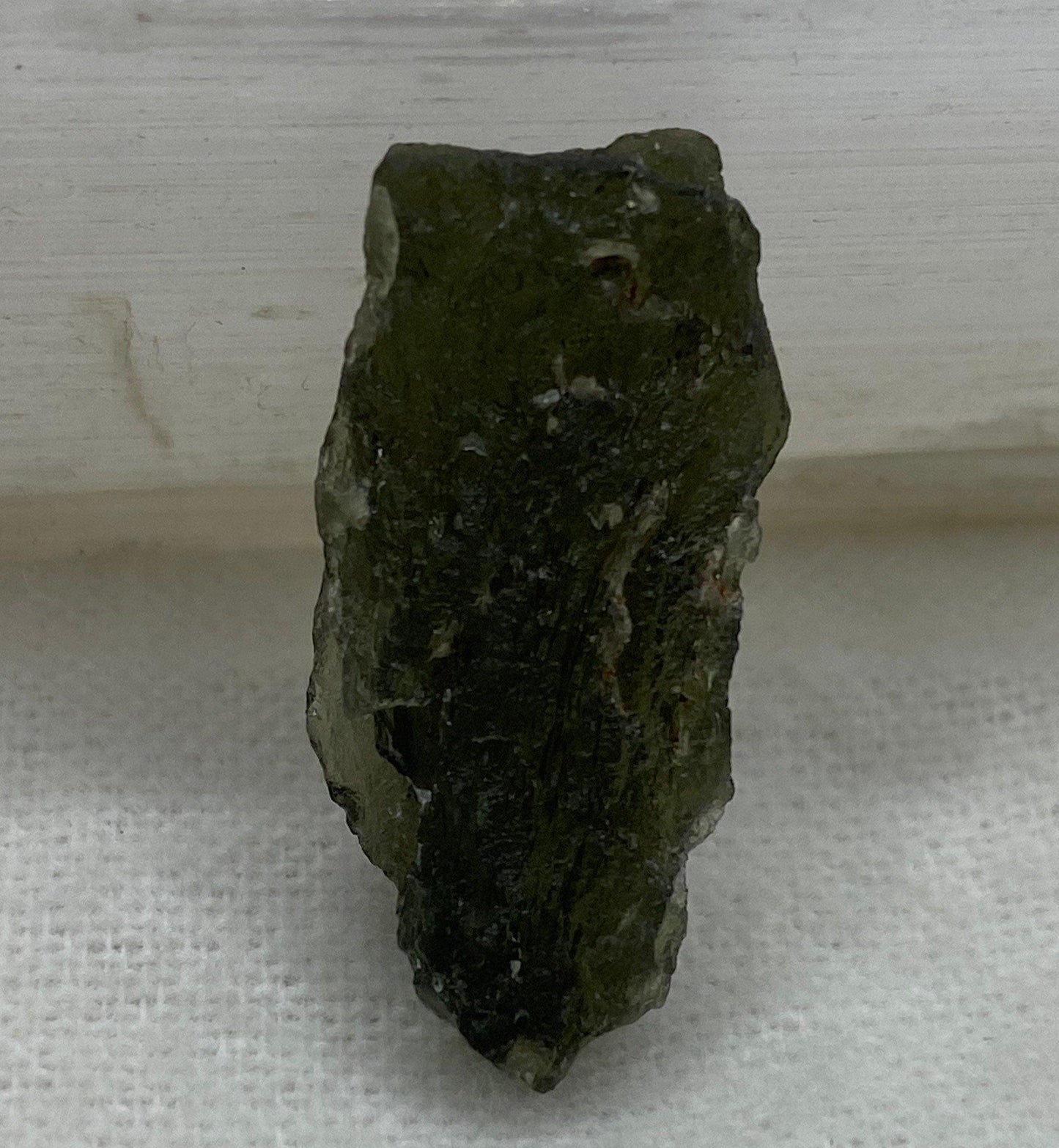 Moldavite Tektite Specimen, 2.71 grams, with Display Case