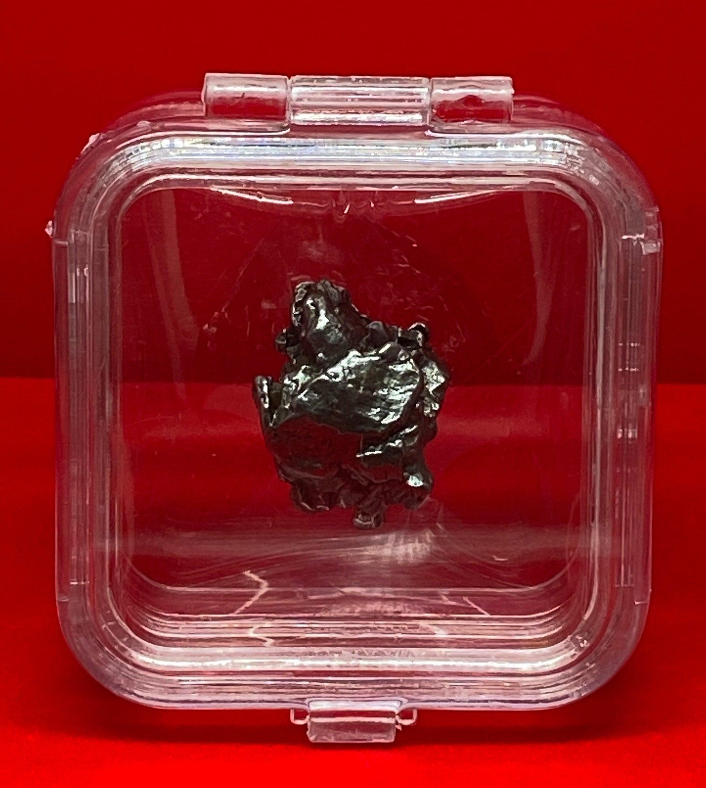 Unique Meteorite Specimen Campo del Cielo 16.71 grams, comes with a display case, stand and a velvet carrying bag, Melted Iron Meteorite