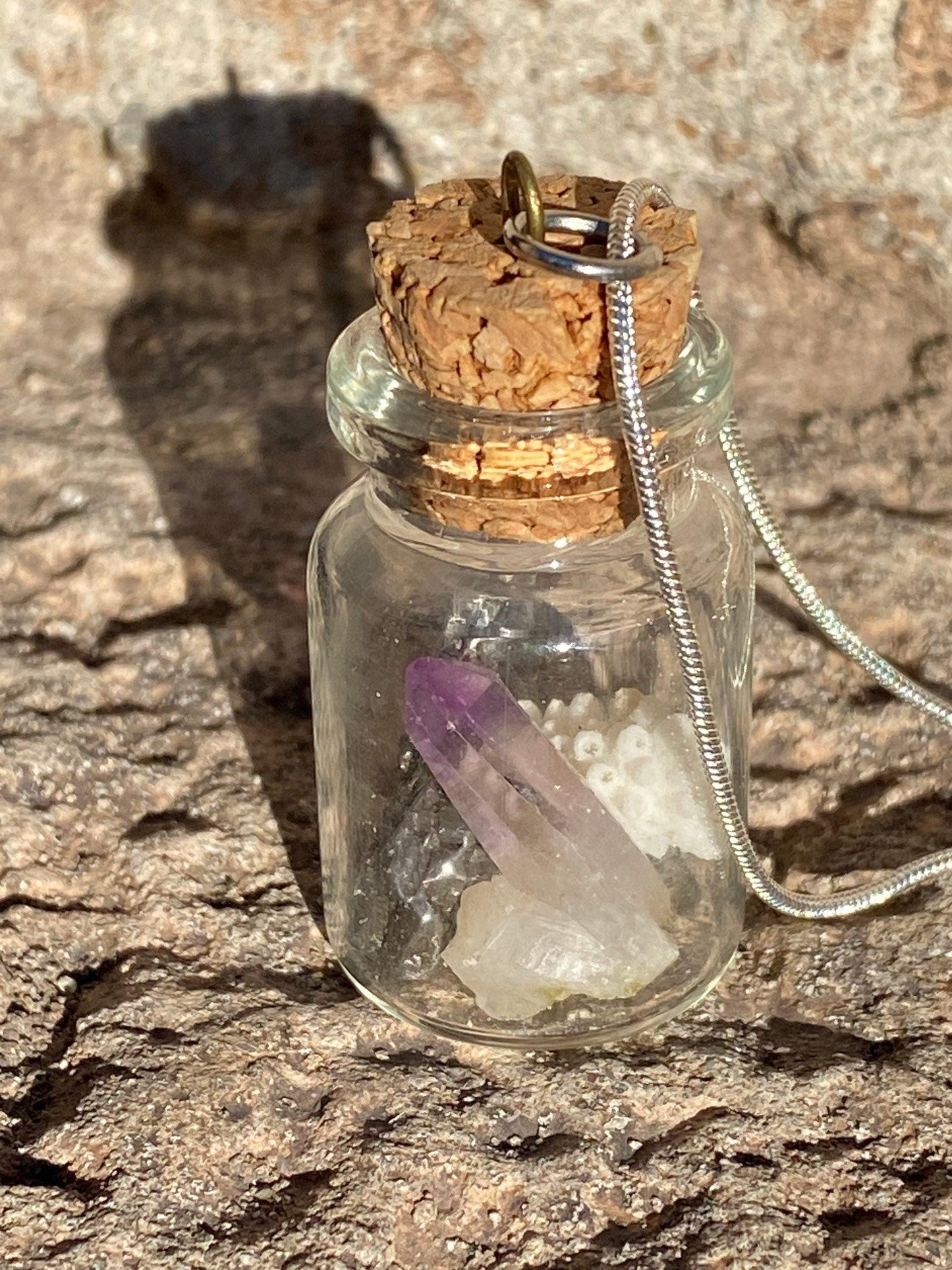 Earth, Water and Space in a Bottle Pendant, (Amethyst Crystal, White Coral, Meteorite)