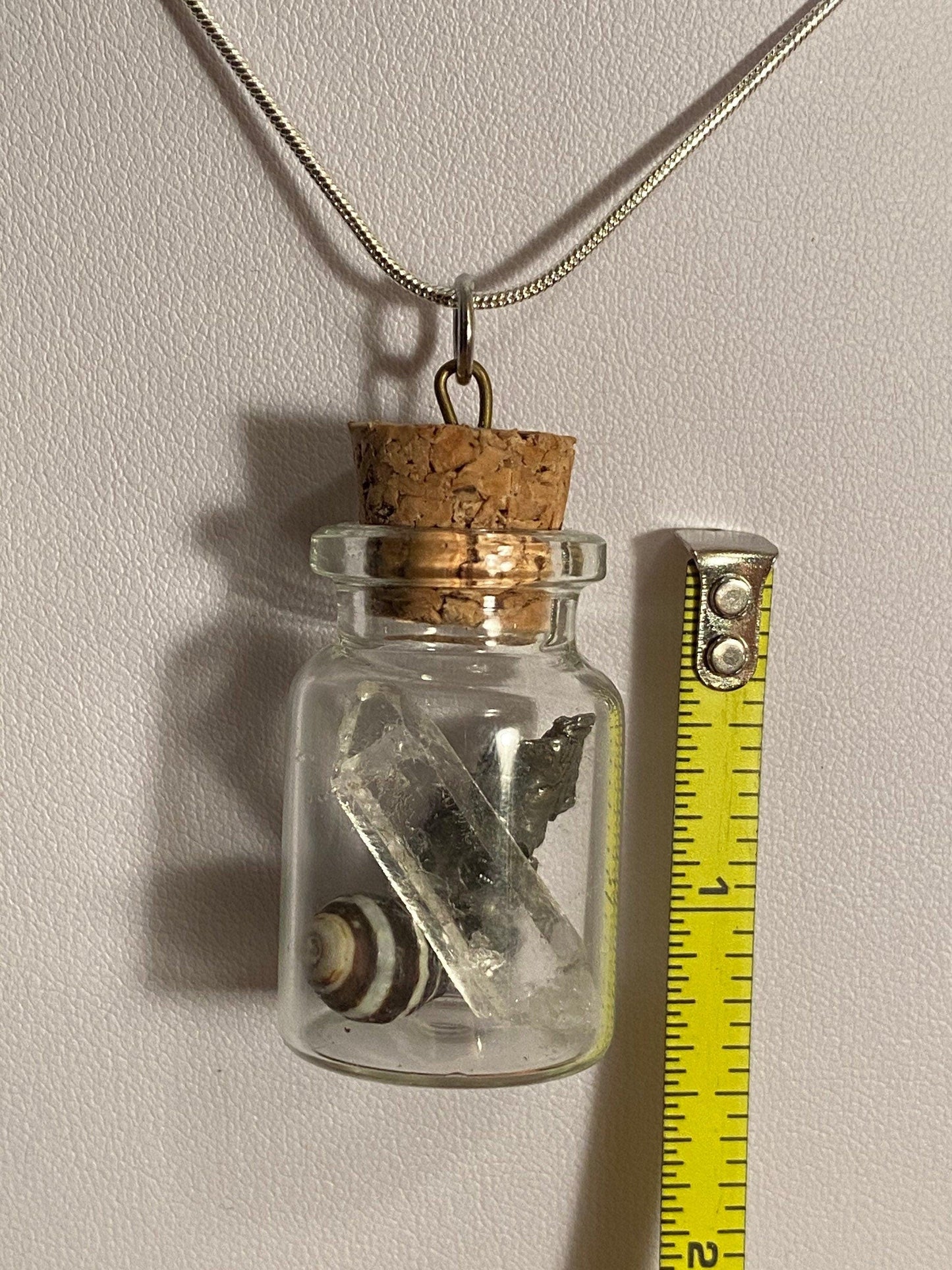 Earth, Water and Space in a Bottle Pendant (Himalayan Crystal, Beehive shell, Meteorite)