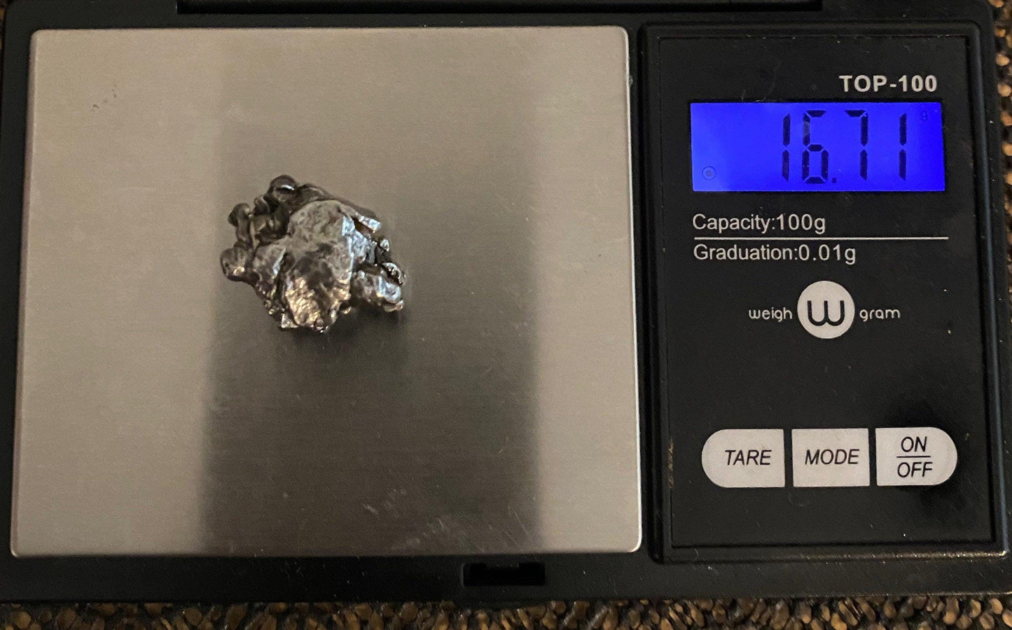 Unique Meteorite Specimen Campo del Cielo 16.71 grams, comes with a display case, stand and a velvet carrying bag, Melted Iron Meteorite