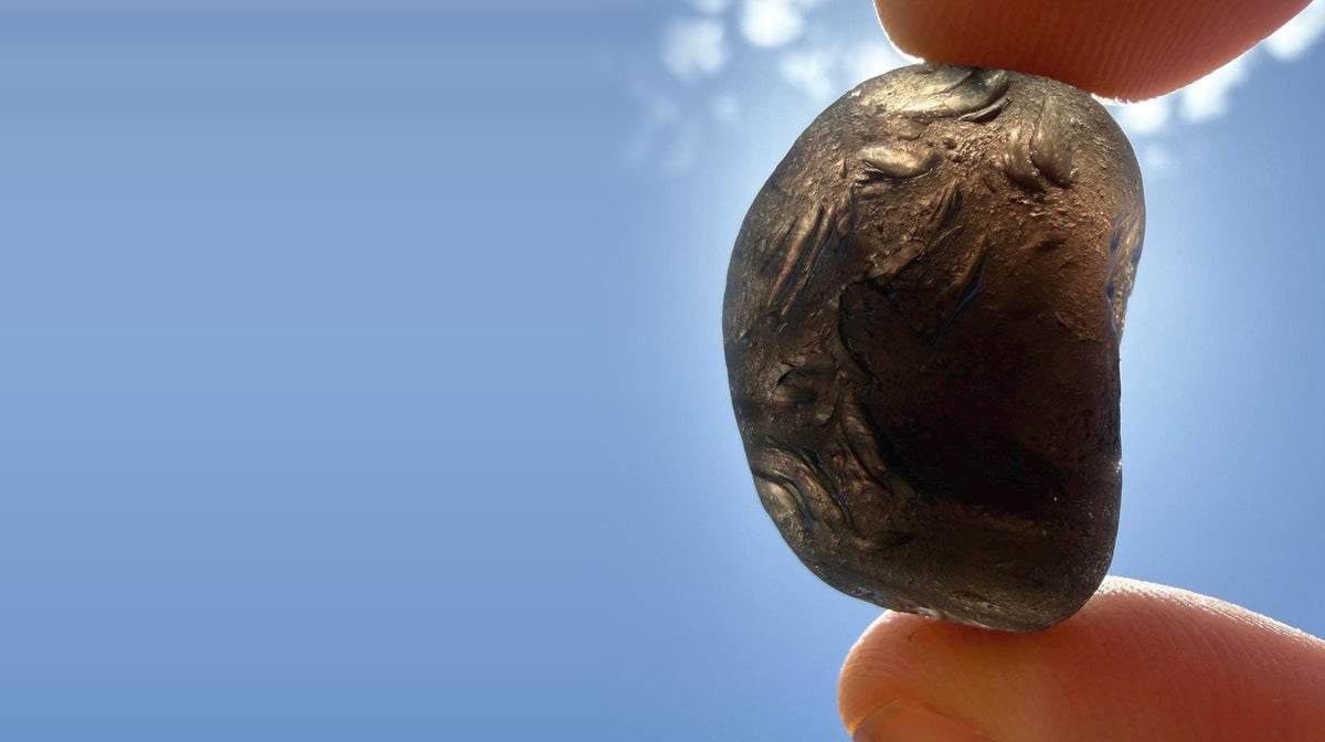 A Saffordite held up against the Arizona sky